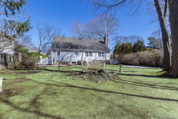 a backyard of a house with seating space