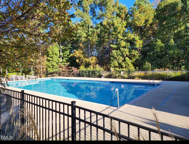 a view of a yard from a balcony