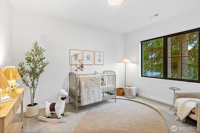 a bed room with a bed and a window