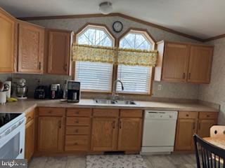 196 Lake Drive Media, PA 19063 - Photo 16 of 42 a kitchen with stainless steel appliances granite countertop a stove a sink and a microwave