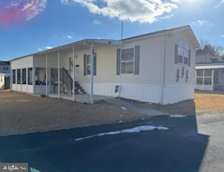 196 Lake Drive Media, PA 19063 - Photo 2 of 42 a view of a house with a street