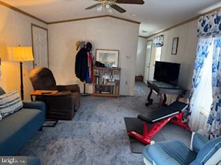 196 Lake Drive Media, PA 19063 - Photo 25 of 42 a living room with furniture and a flat screen tv