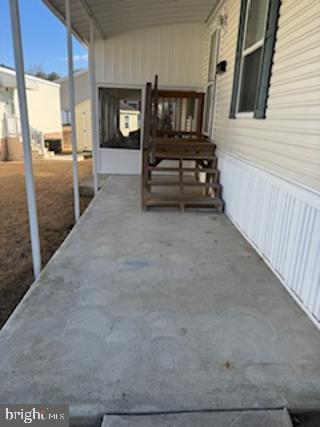 196 Lake Drive Media, PA 19063 - Photo 6 of 42 a view of a livingroom with furniture and staircase