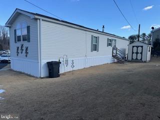 196 Lake Drive Media, PA 19063 - Photo 10 of 42 a view of an house with porch and furniture