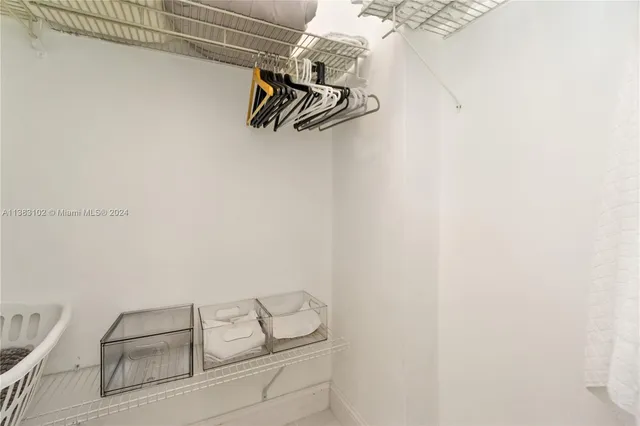 a view of balcony with potted plants and palm trees