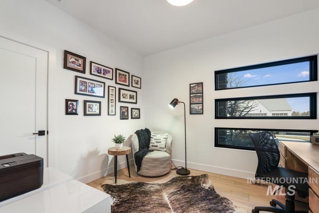 3140 Moonrise Road Twin Falls, ID 83301 - Photo 17 of 39 Home office with baseboards and light wood finished floors