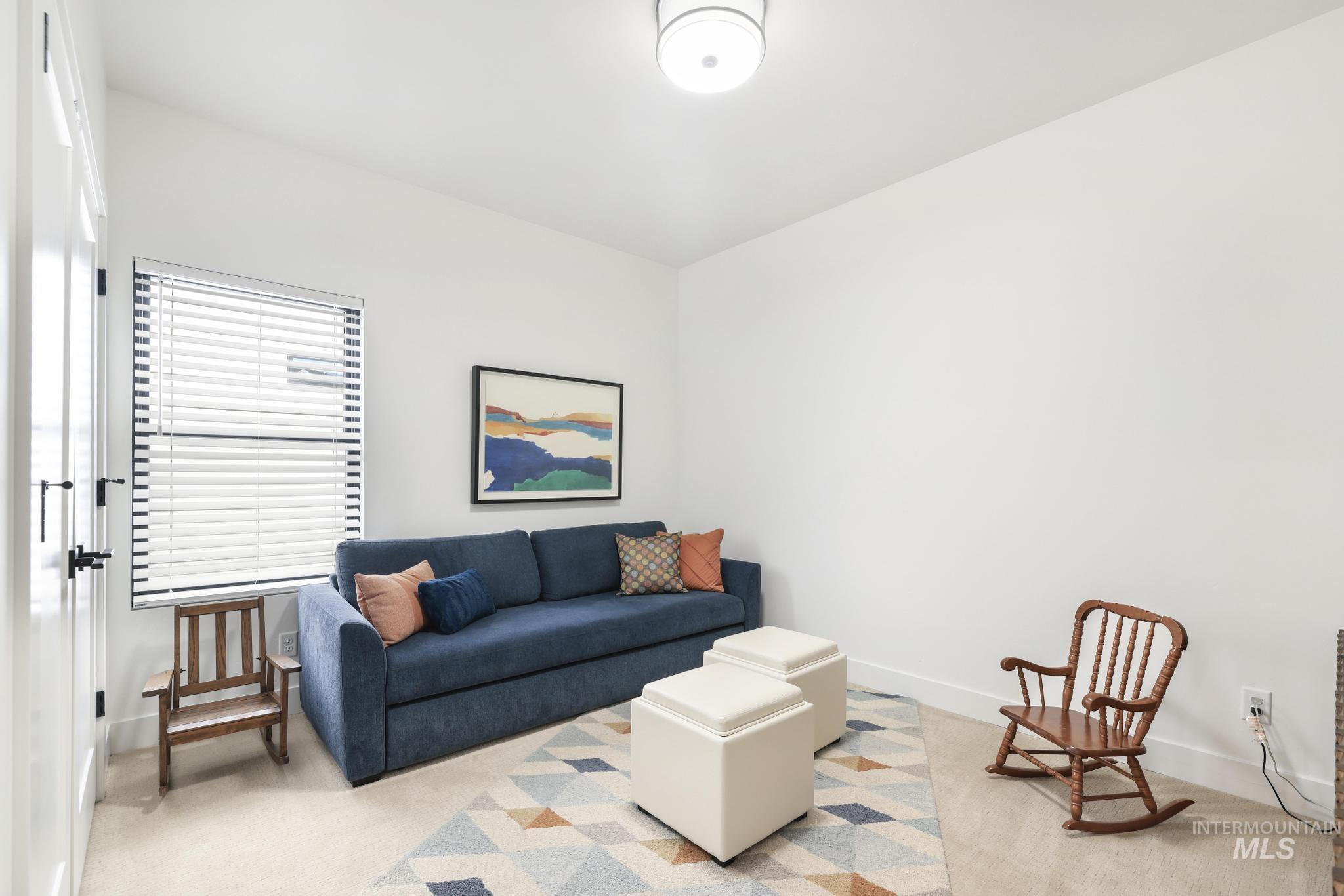 3140 Moonrise Road Twin Falls, ID 83301 - Photo 32 of 39 Carpeted living room featuring baseboards