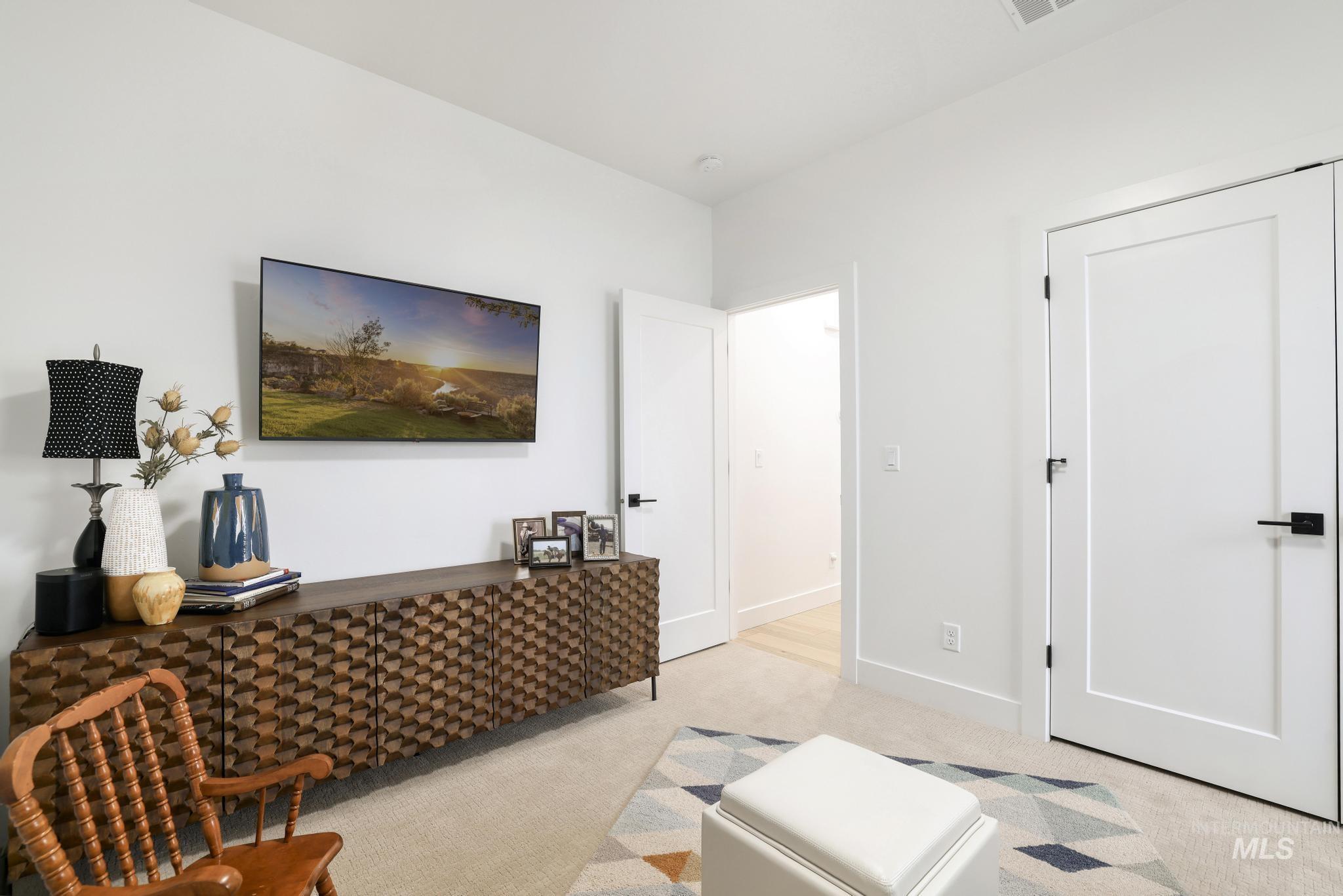 3140 Moonrise Road Twin Falls, ID 83301 - Photo 33 of 39 Sitting room with light carpet and baseboards