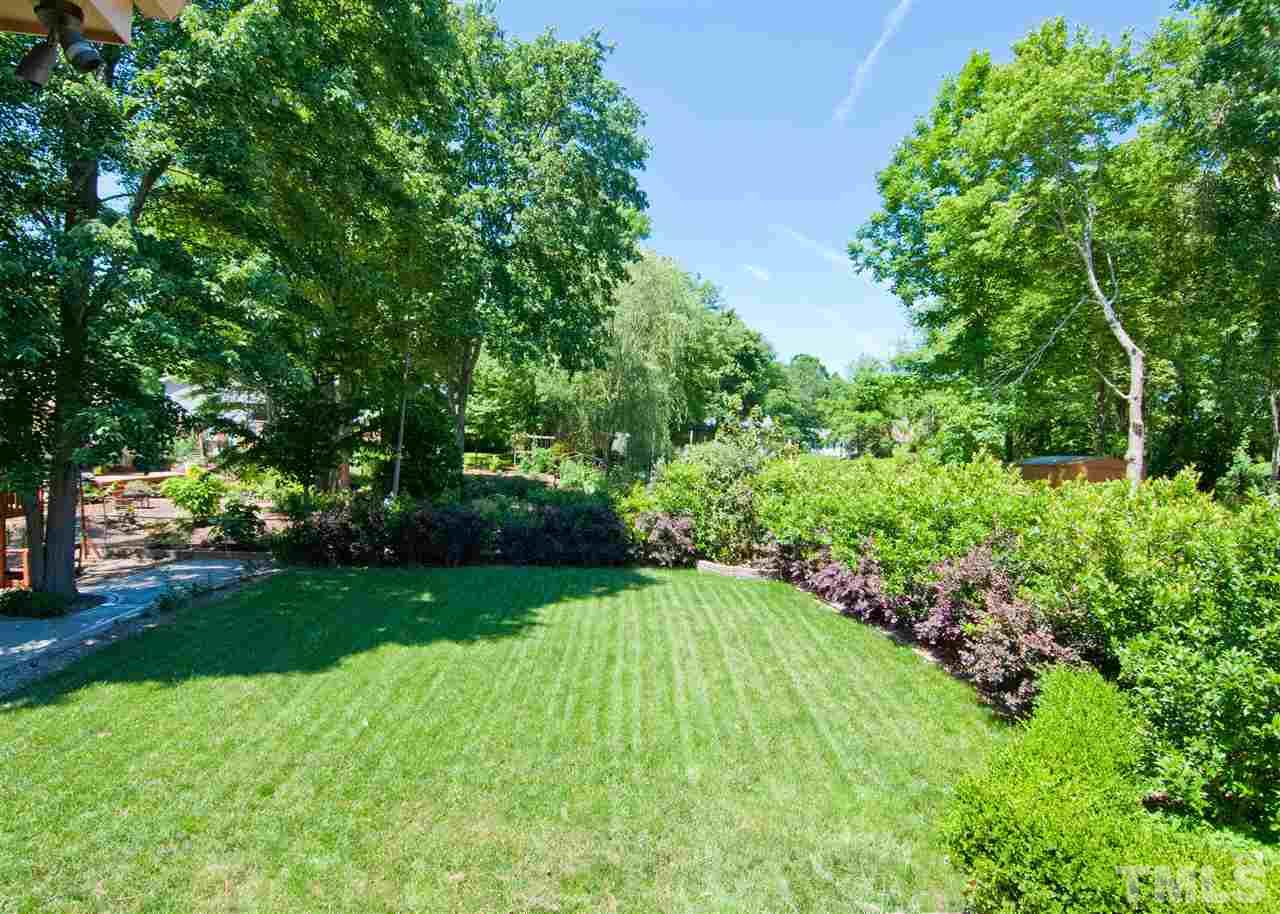 520 Smokeridge Lane Raleigh, NC 27615 - Photo 25 of 25 a view of a garden with a house
