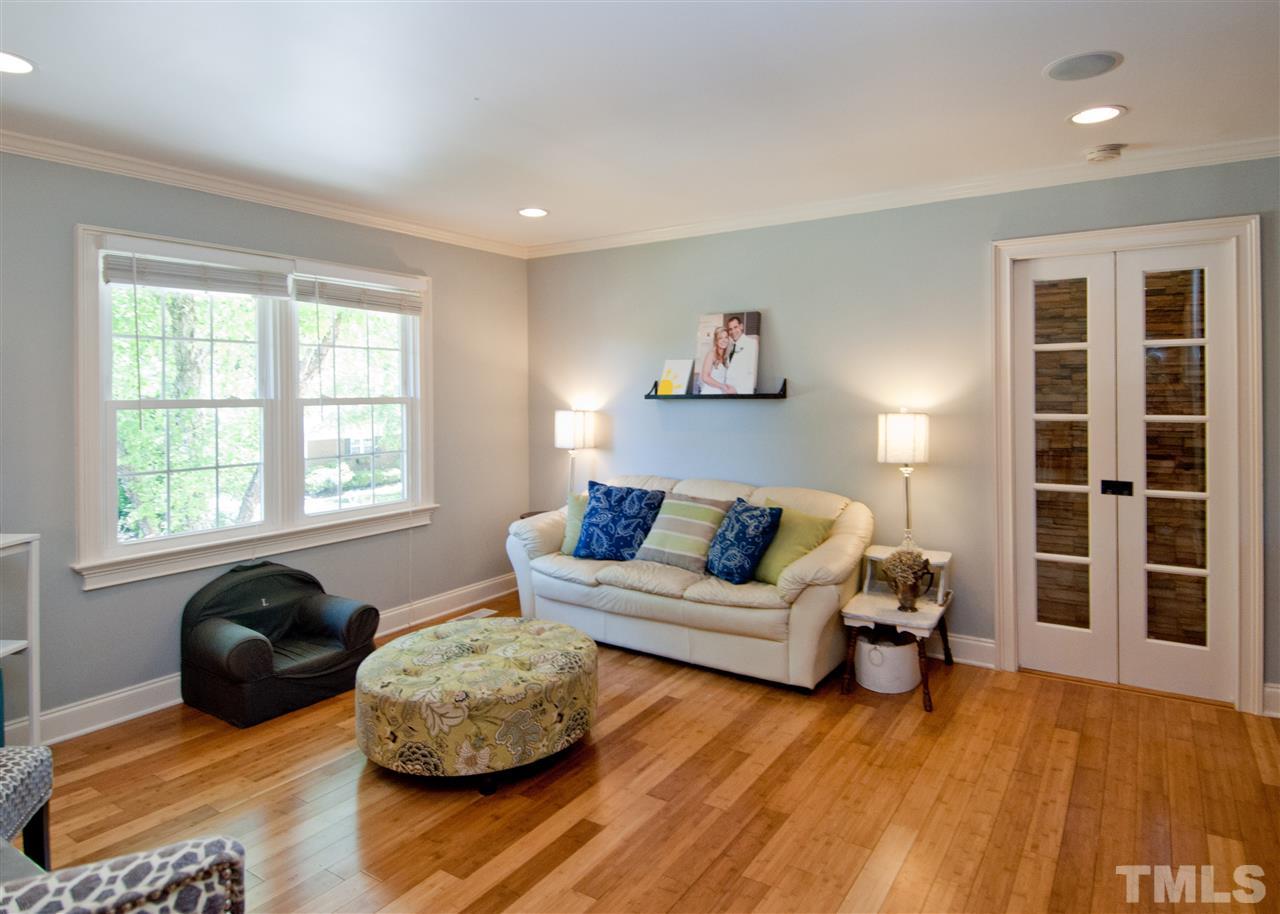 520 Smokeridge Lane Raleigh, NC 27615 - Photo 7 of 25 a living room with furniture and a window