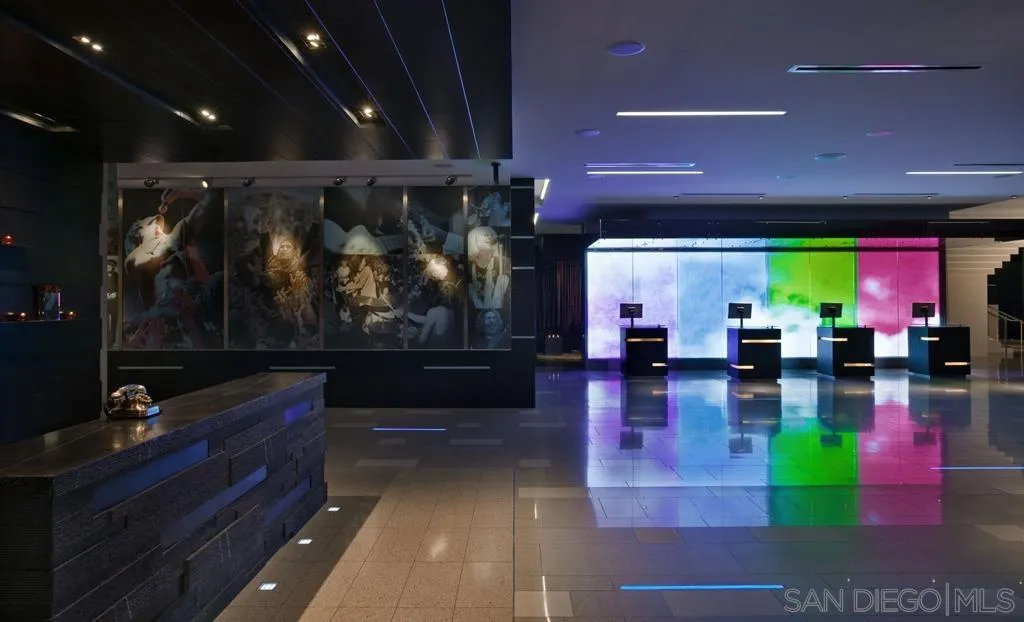 207 Fifth Avenue, Unit 737 San Diego, CA 92101 - Photo 11 of 14 a room with lots of tables and chairs