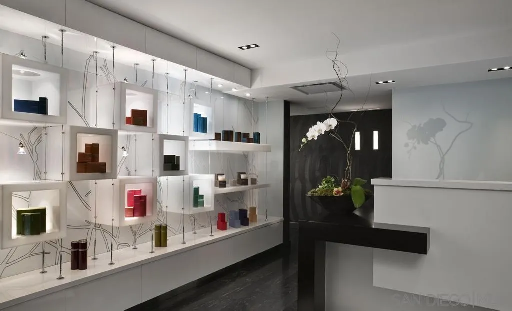 207 Fifth Avenue, Unit 737 San Diego, CA 92101 - Photo 14 of 14 a kitchen with stainless steel appliances granite countertop a refrigerator and a sink