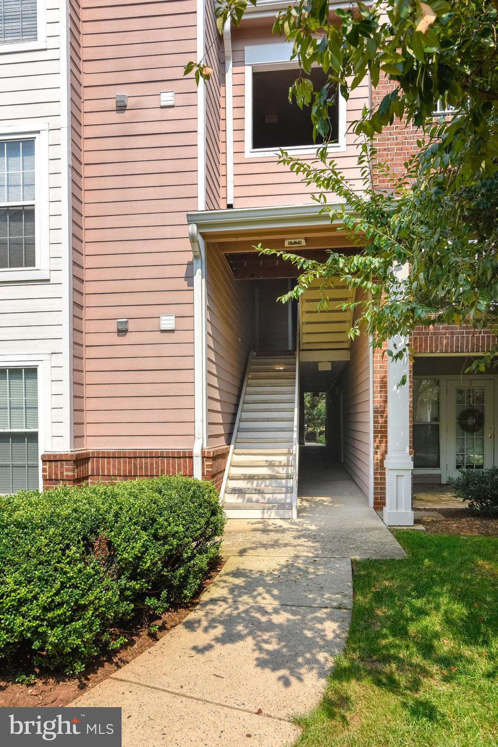 21023 Timber Ridge Terrace, Unit 302 Ashburn, VA 20147 - Photo 11 of 16 Exterior Front