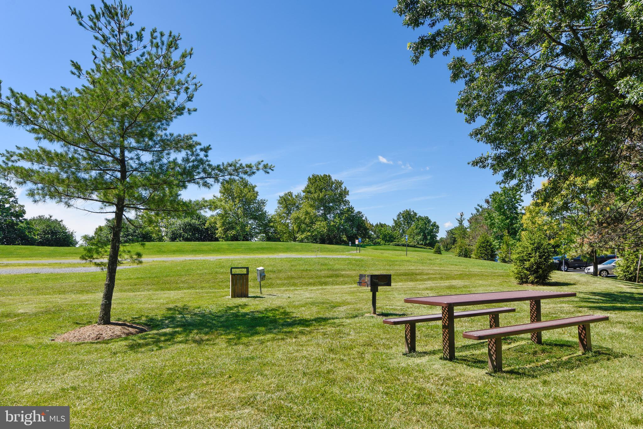 21023 Timber Ridge Terrace, Unit 302 Ashburn, VA 20147 - Photo 13 of 16 Outdoor Community Space