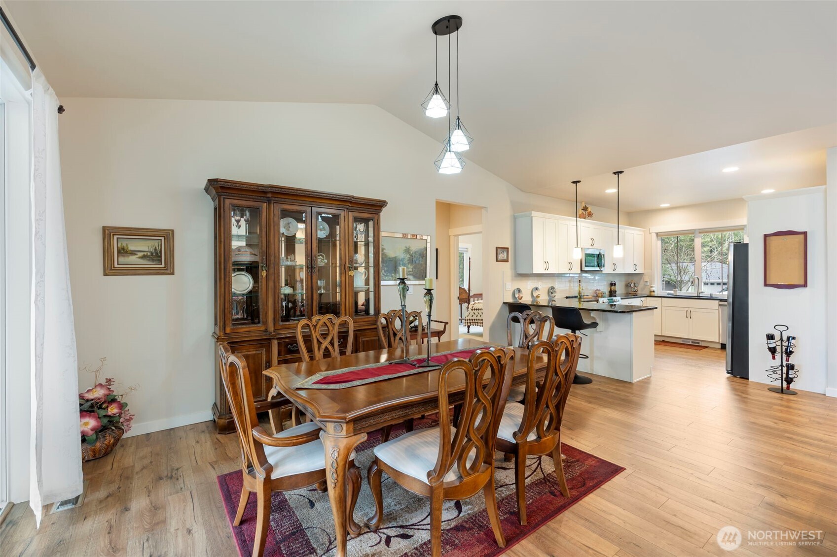 71 East Hemlock Court Union, WA 98592 - Photo 11 of 32 a view of a dining room with furniture and wooden floor