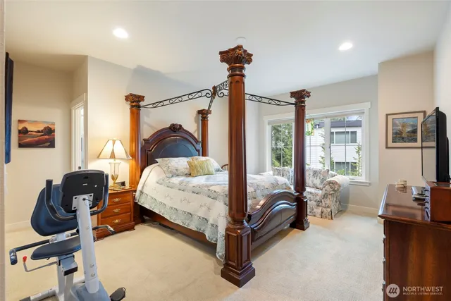 a bed room with furniture and a window