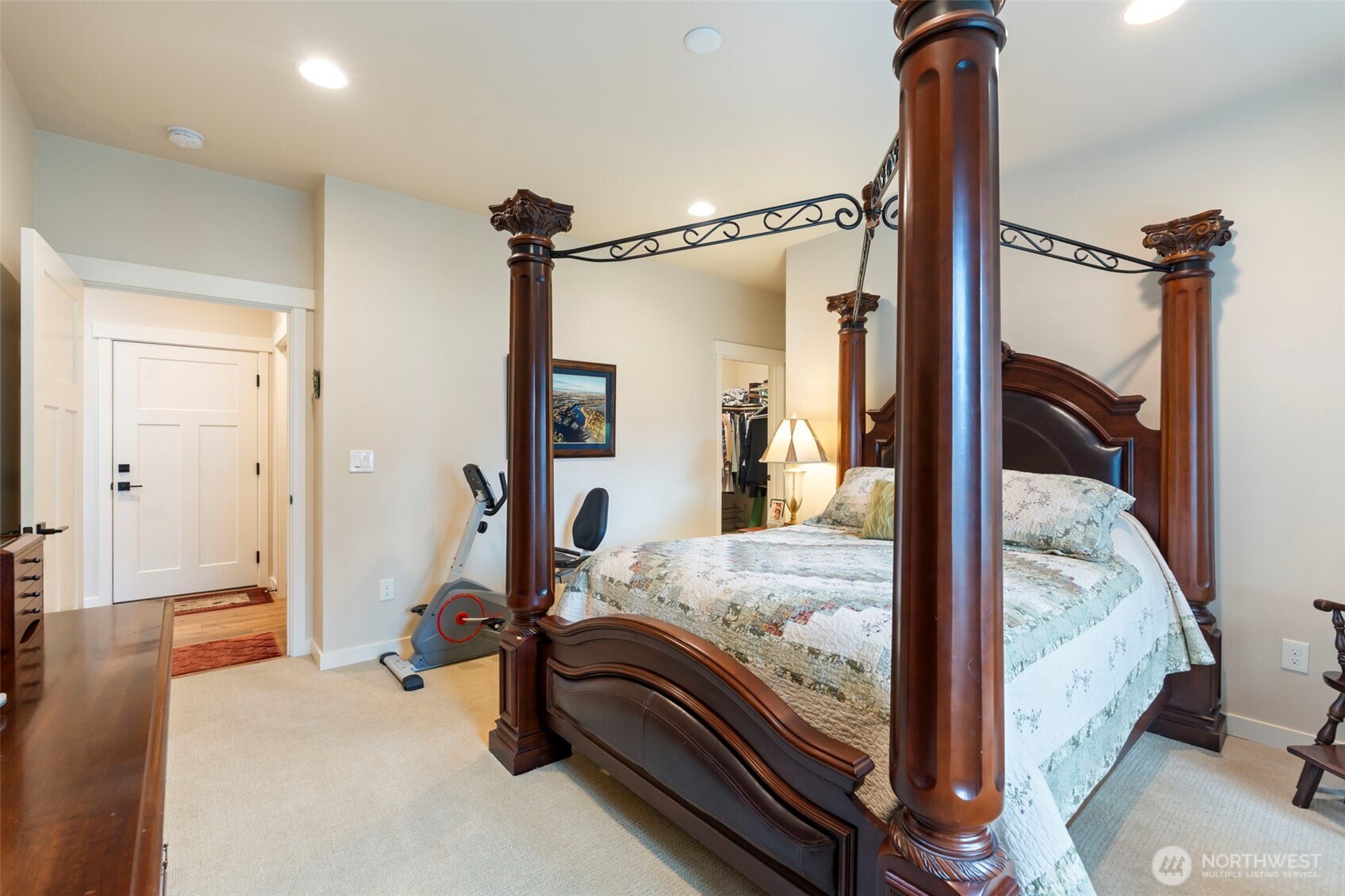 71 East Hemlock Court Union, WA 98592 - Photo 13 of 32 a bedroom with a bed and wooden floor