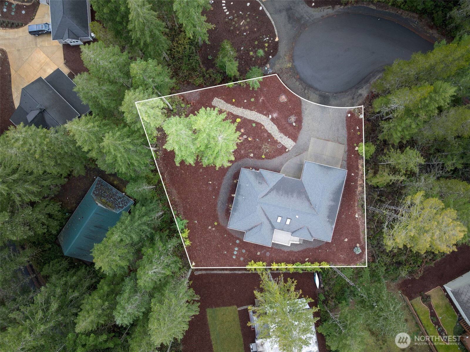 71 East Hemlock Court Union, WA 98592 - Photo 27 of 32 an aerial view of a house with a garden