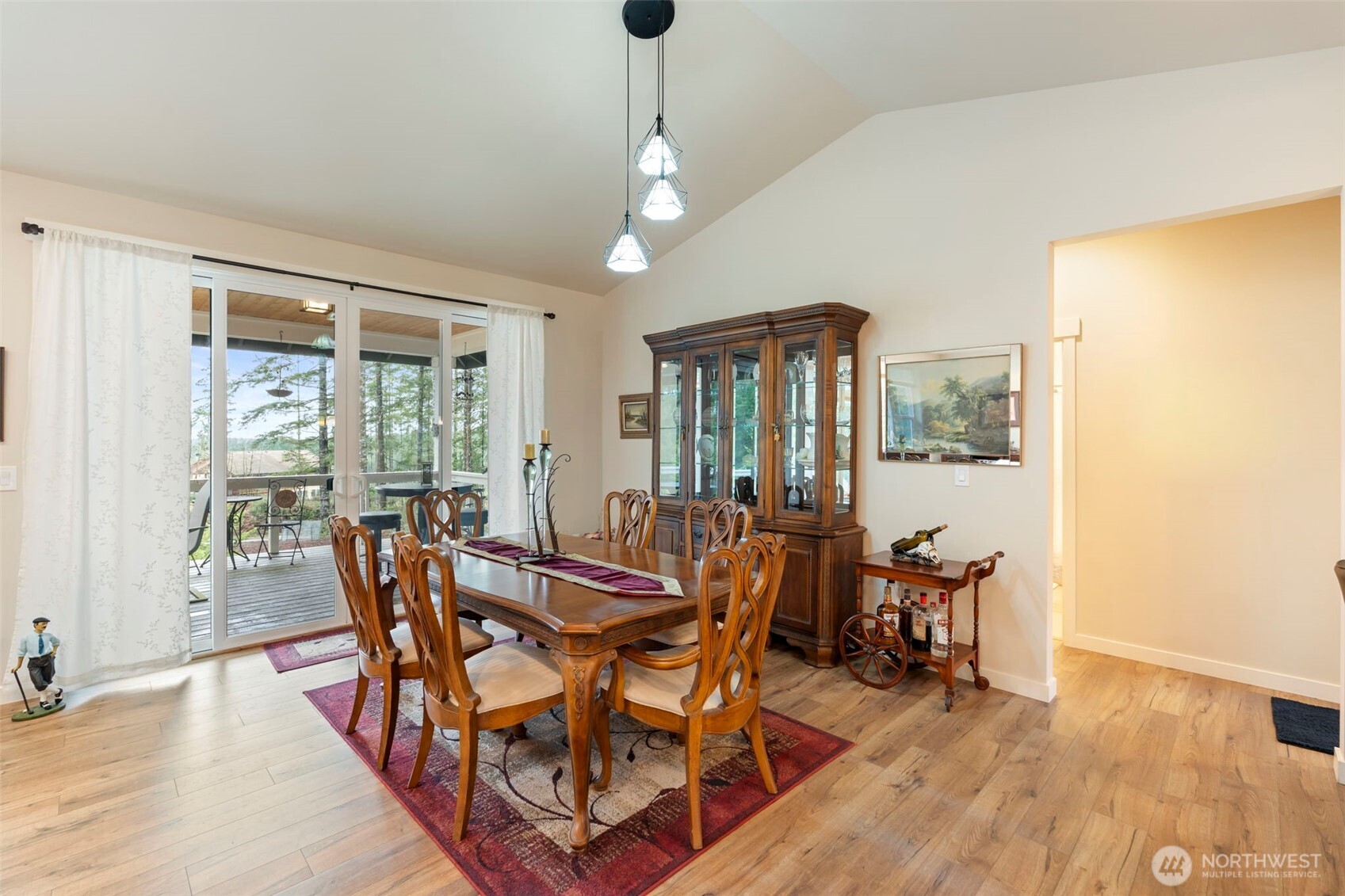 71 East Hemlock Court Union, WA 98592 - Photo 10 of 32 a view of a dining room with furniture window and wooden floor