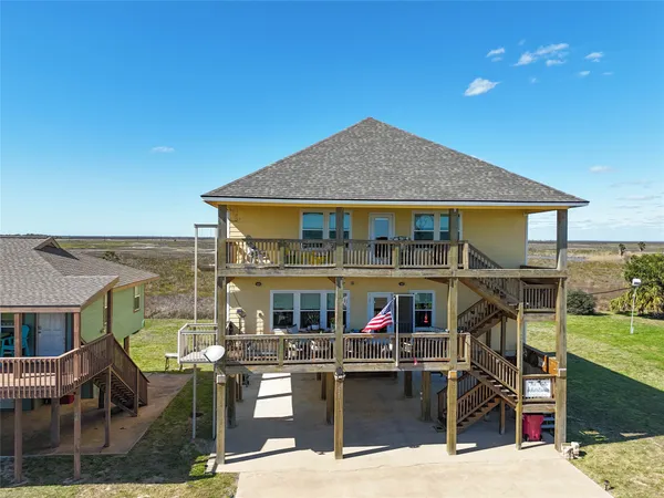 a view of house with outdoor seating space