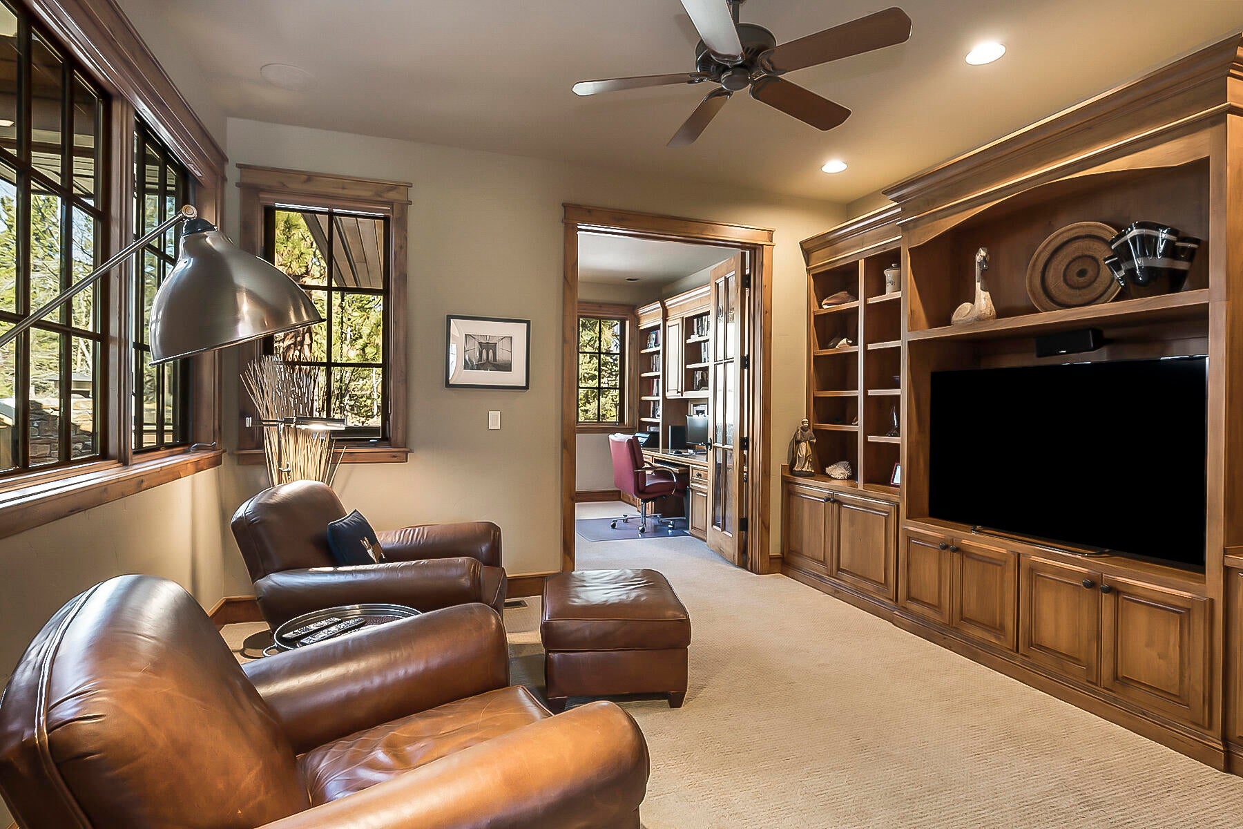 19436 Green Lakes Loop Bend, OR 97702 - Photo 30 of 53 Cozy den if the perfect place to relax or watch TV. Features built-in media center with book shelves.
