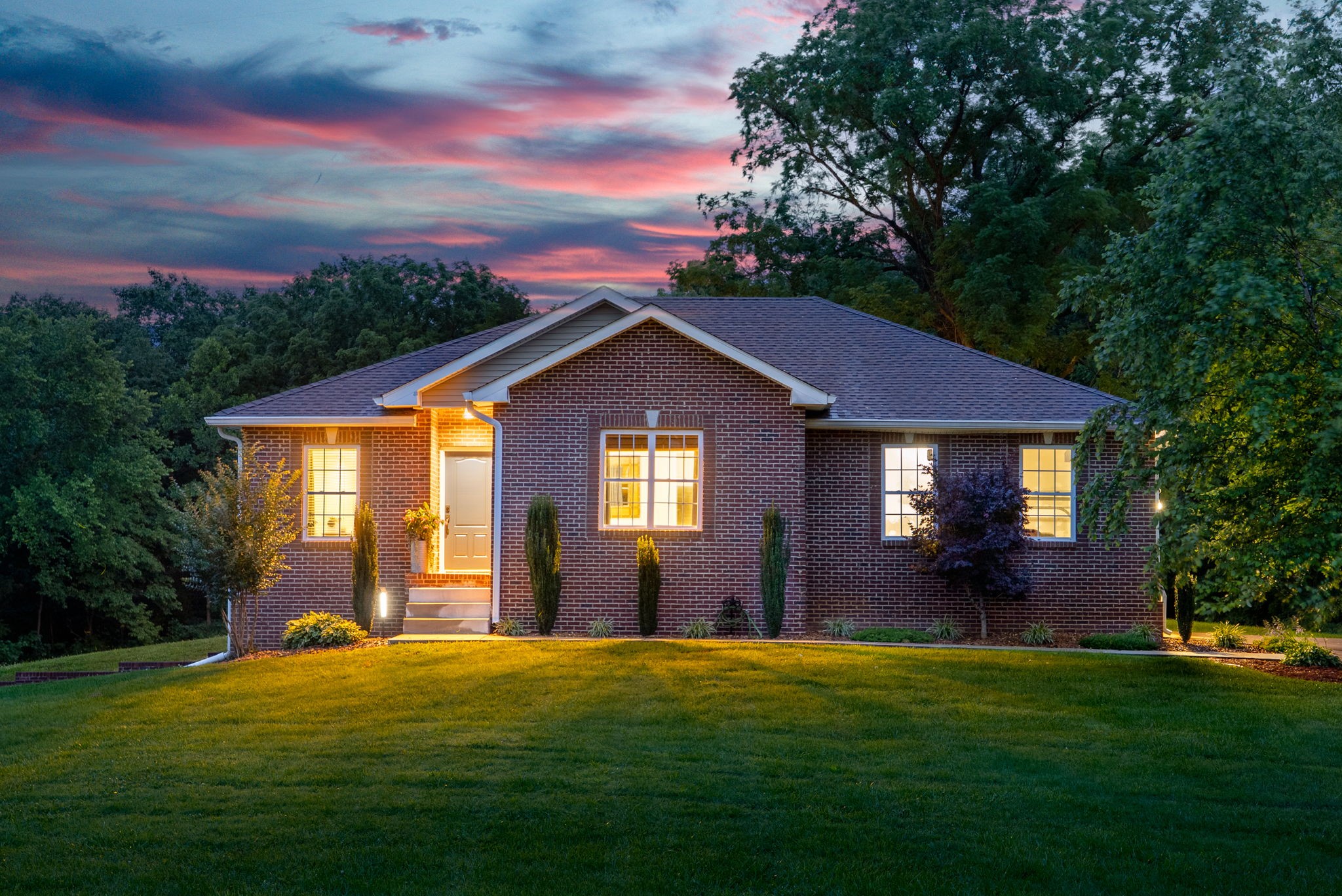 2625 Ford Road Adams, TN 37010 - Photo 1 of 34 a front view of a house with a yard