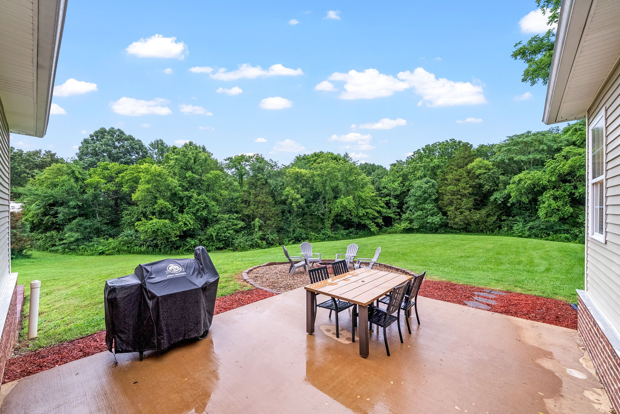 2625 Ford Road Adams, TN 37010 - Photo 29 of 34 an outdoor view of a garden with patio