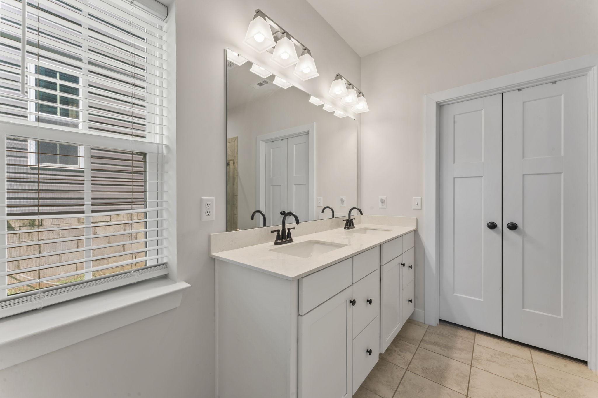 907 Caywood Road Smyrna, TN 37167 - Photo 12 of 32 a bathroom with a sink and a mirror