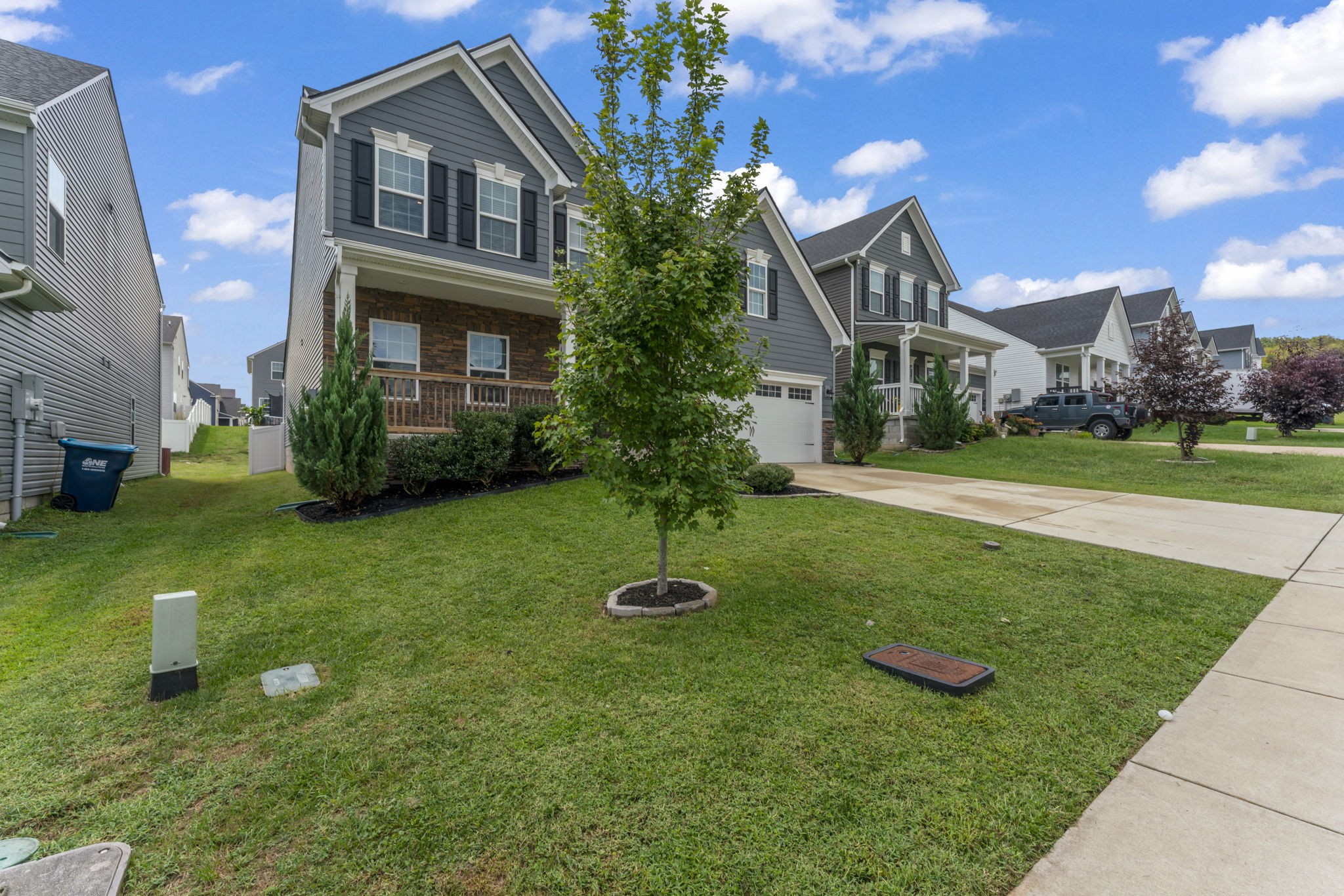 907 Caywood Road Smyrna, TN 37167 - Photo 28 of 32 a front view of a house with a yard