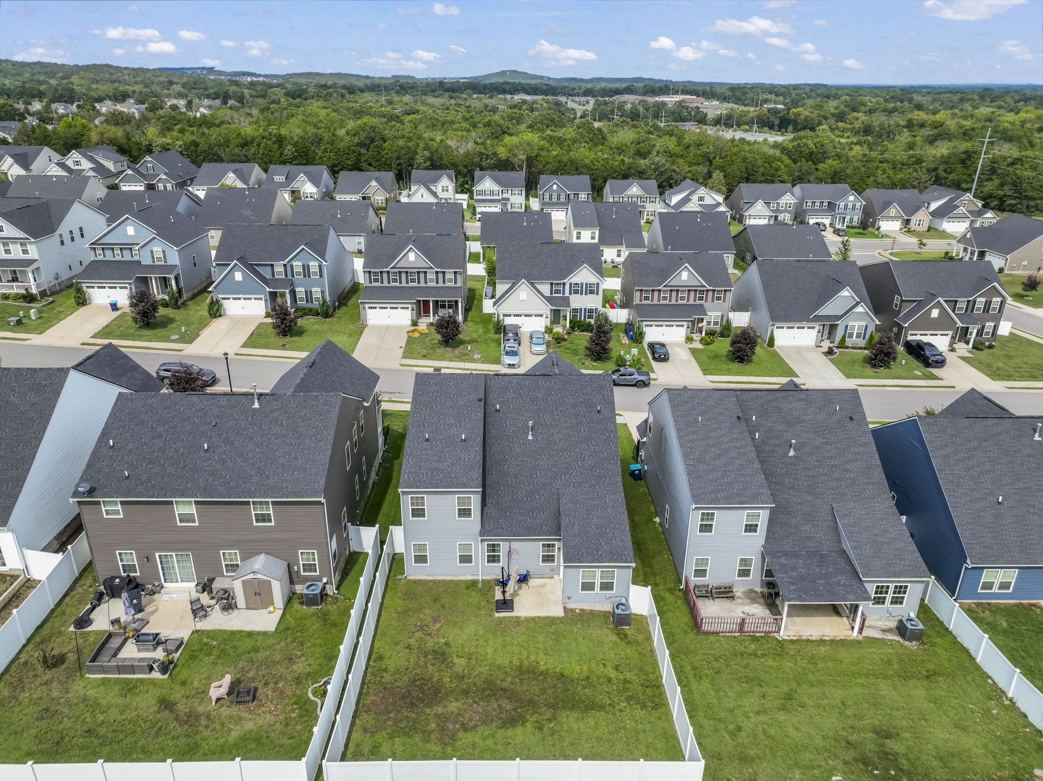 907 Caywood Road Smyrna, TN 37167 - Photo 30 of 32 an aerial view of multiple houses with yard
