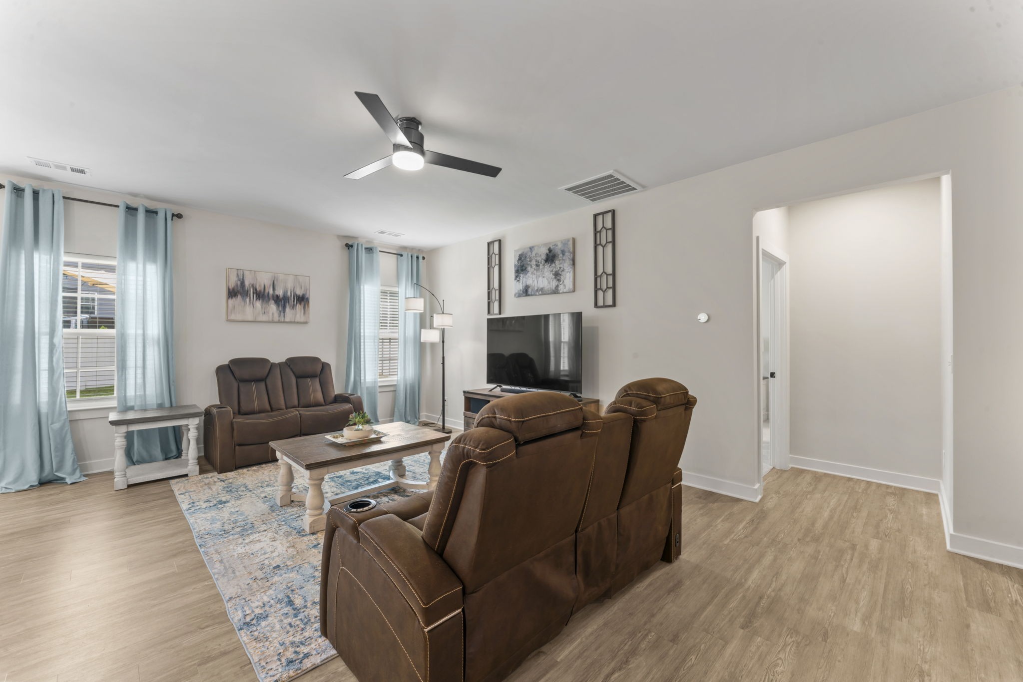 907 Caywood Road Smyrna, TN 37167 - Photo 4 of 32 a living room with furniture and a wooden floor