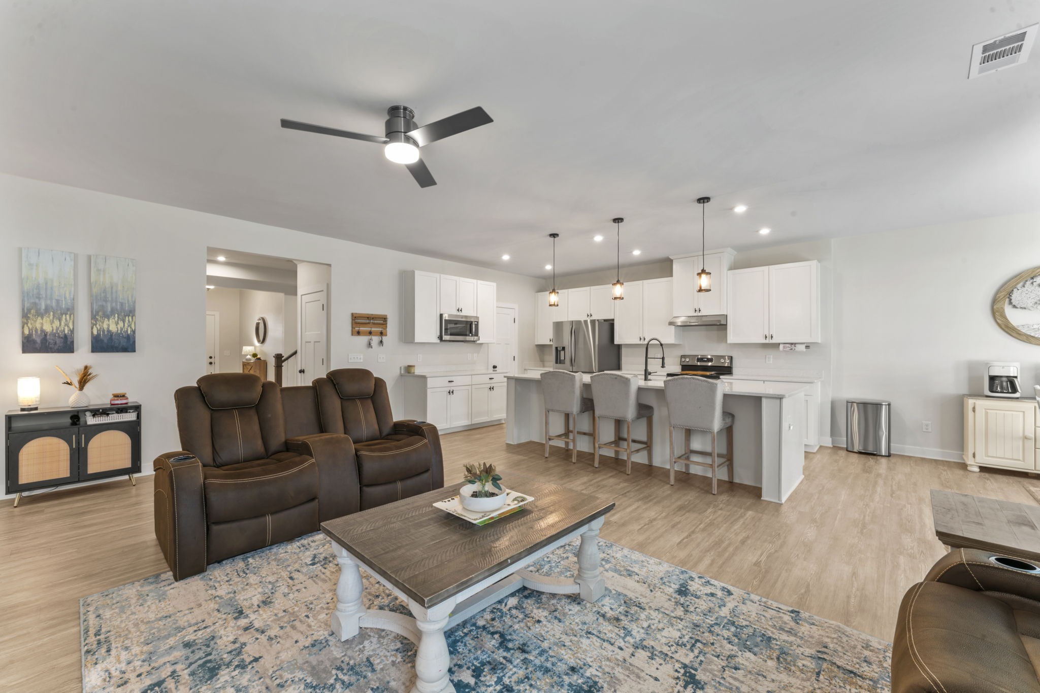 907 Caywood Road Smyrna, TN 37167 - Photo 5 of 32 a living room with furniture kitchen view and a table