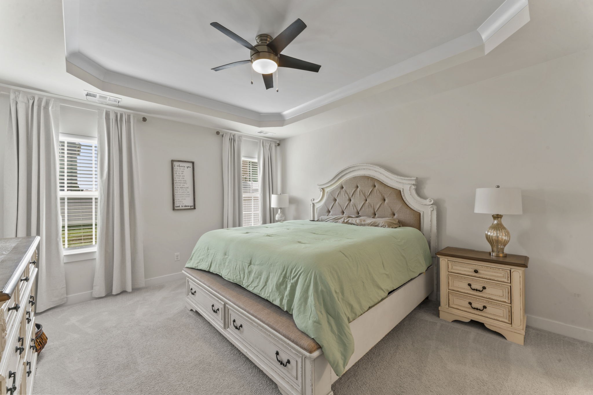 907 Caywood Road Smyrna, TN 37167 - Photo 10 of 32 a spacious bedroom with a bed and a chandelier