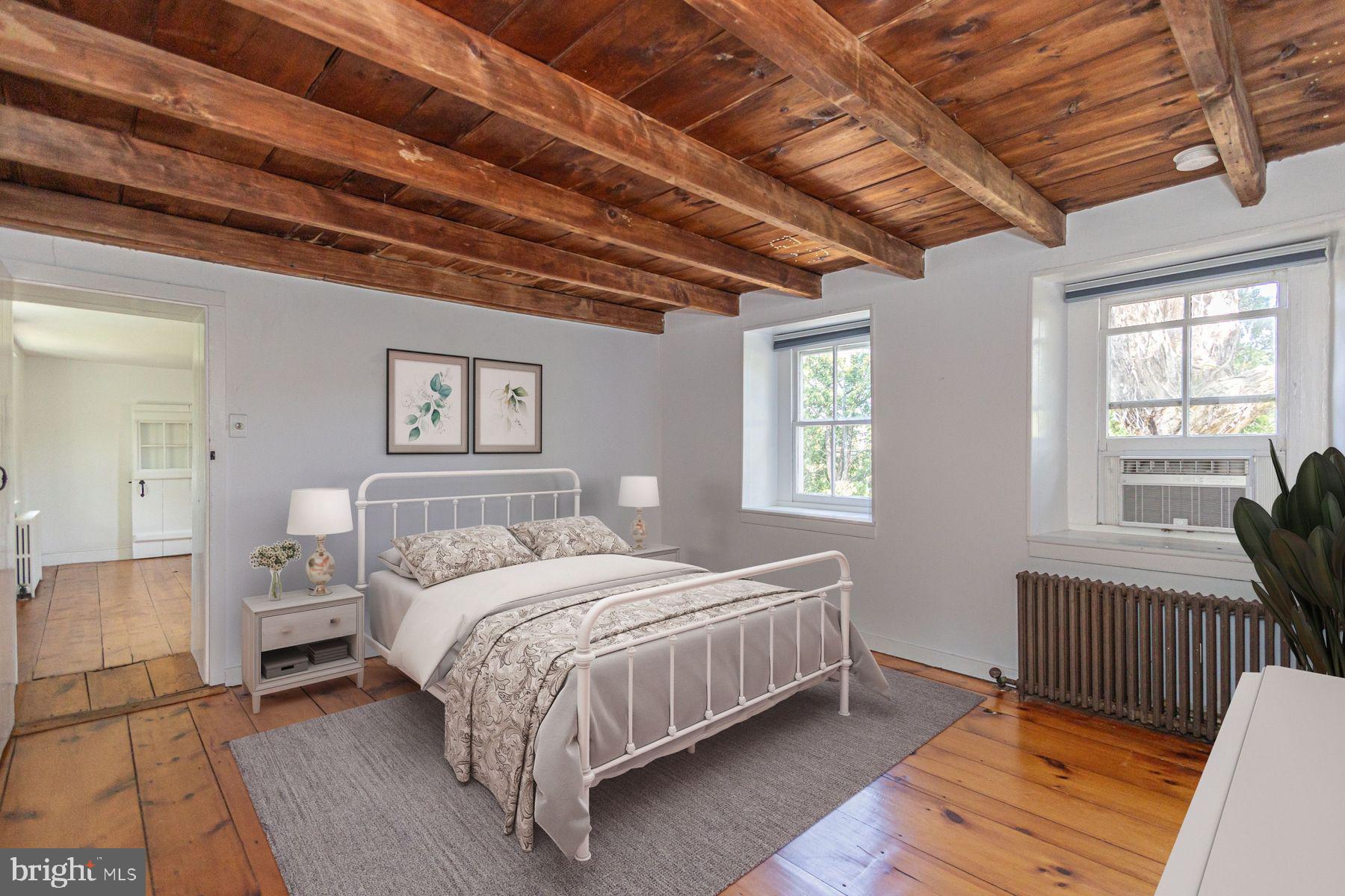 5925 Carversville Road Doylestown, PA 18902 - Photo 23 of 44 a bedroom with a bed a couch and dresser