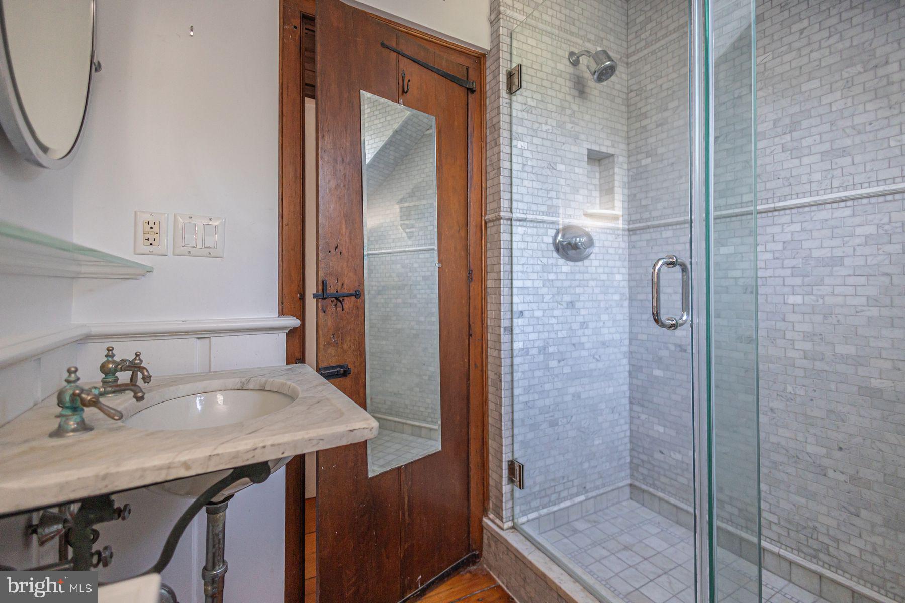 5925 Carversville Road Doylestown, PA 18902 - Photo 24 of 44 a bathroom with a sink and a mirror