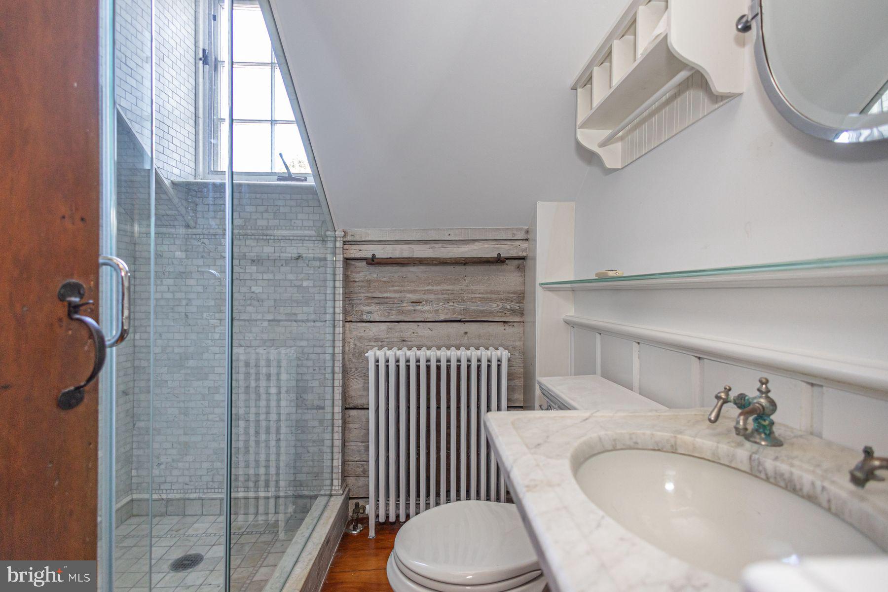 5925 Carversville Road Doylestown, PA 18902 - Photo 25 of 44 a bathroom with a granite countertop bathtub sink vanity mirror and toilet