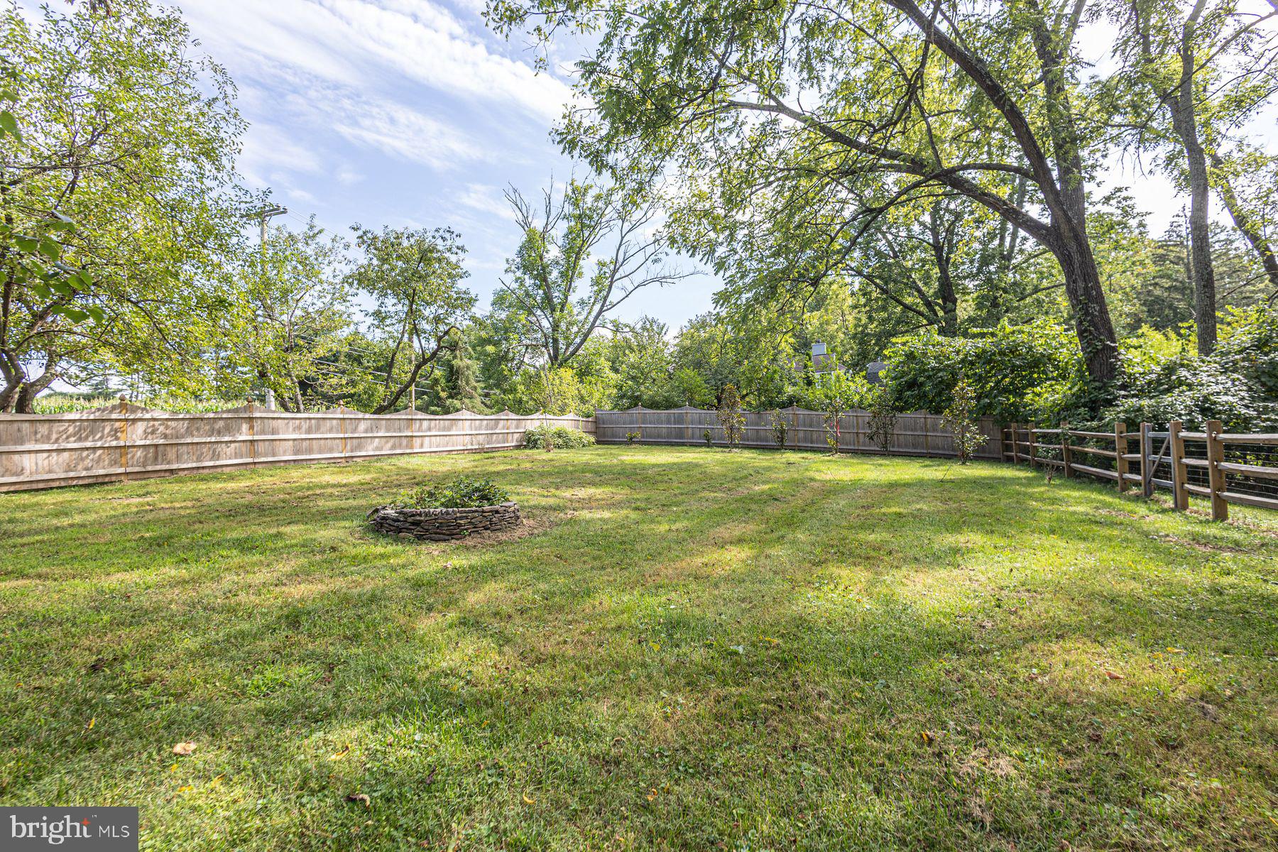 5925 Carversville Road Doylestown, PA 18902 - Photo 36 of 44 a view of outdoor space with swimming pool and trees in the background