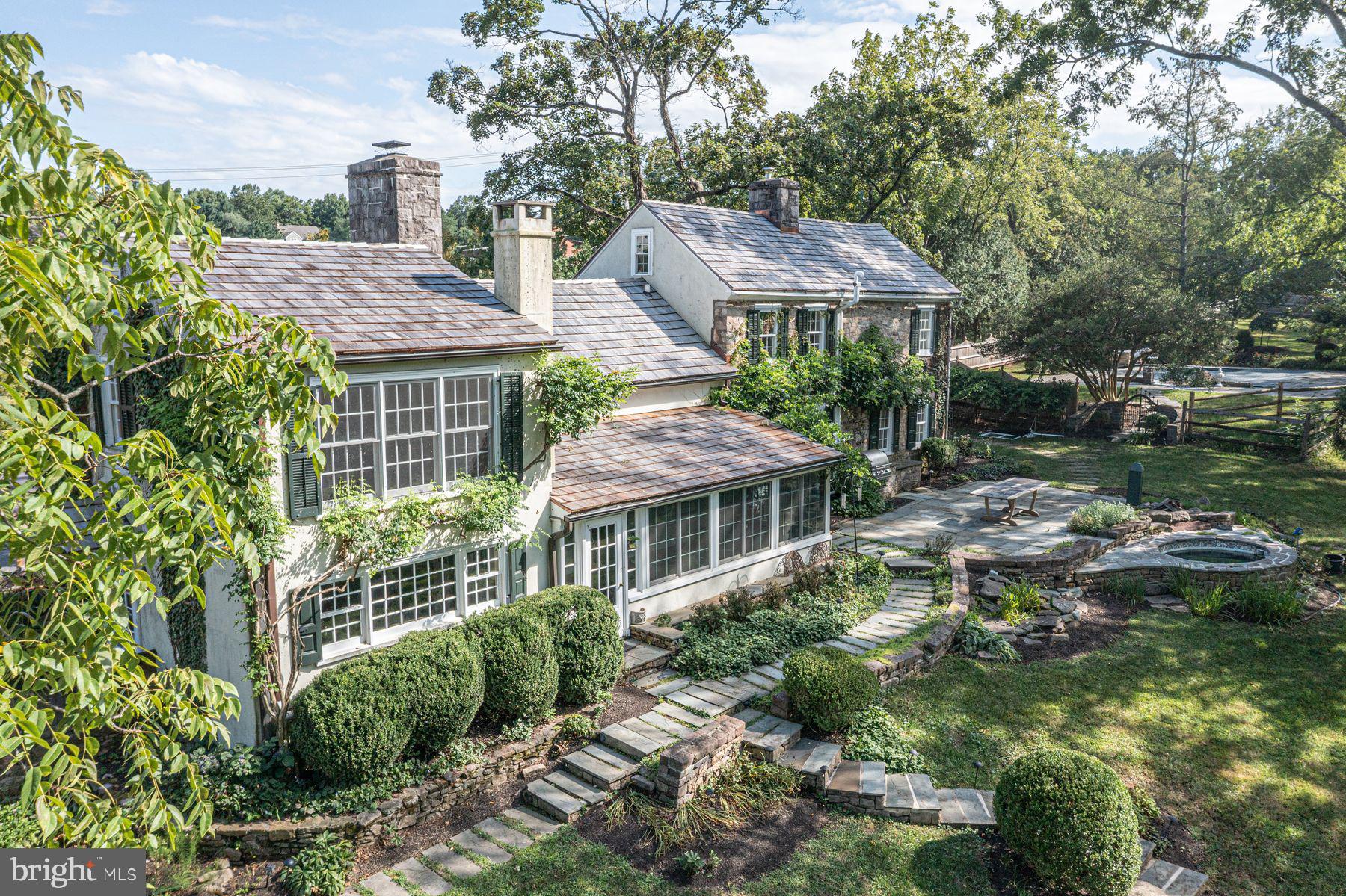 5925 Carversville Road Doylestown, PA 18902 - Photo 39 of 44 a aerial view of a house with a yard and potted plants