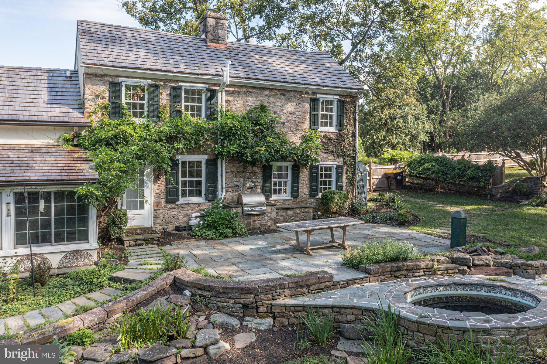 5925 Carversville Road Doylestown, PA 18902 - Photo 40 of 44 a front view of a house with garden
