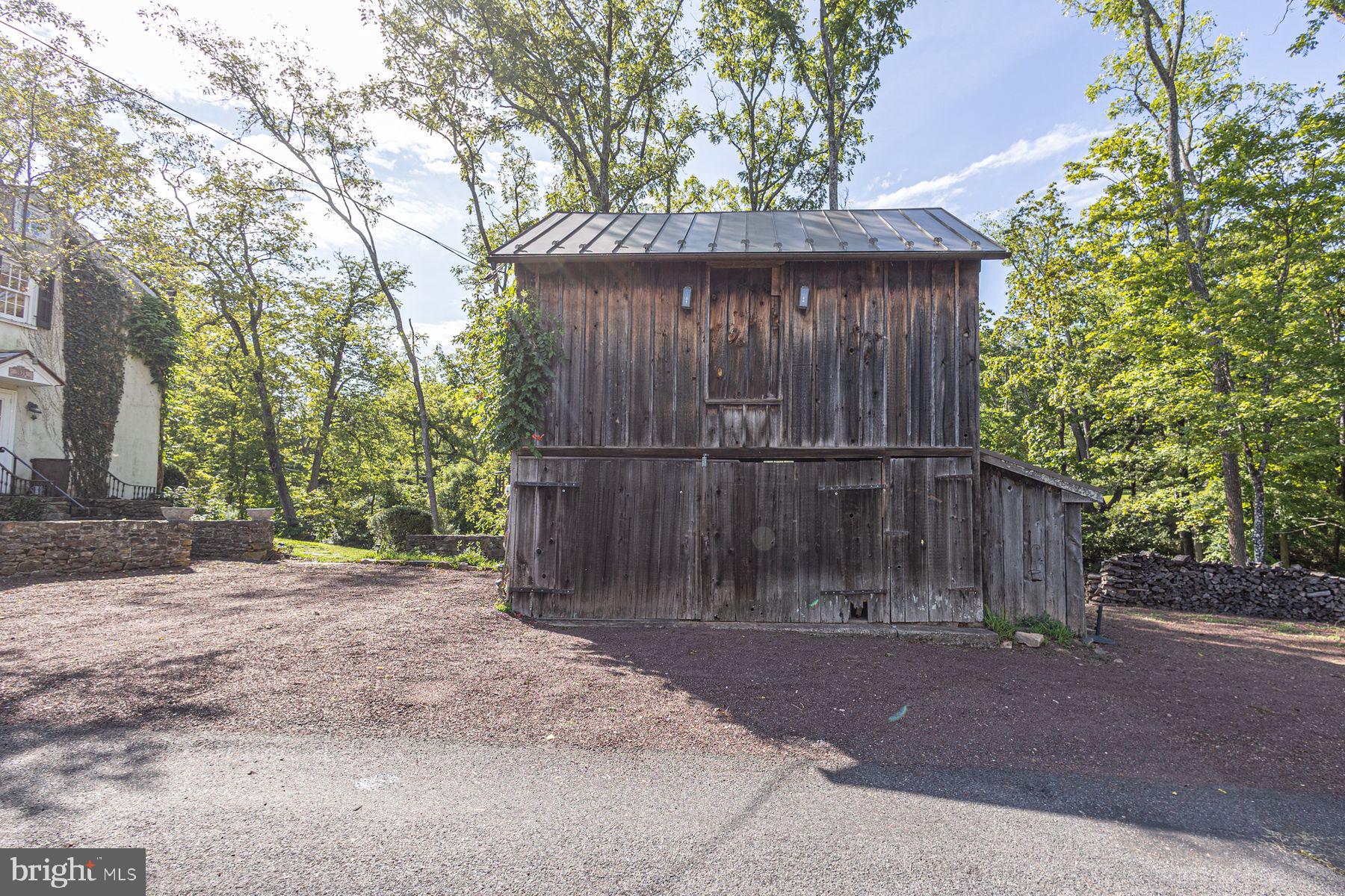 5925 Carversville Road Doylestown, PA 18902 - Photo 42 of 44 a backyard of a house