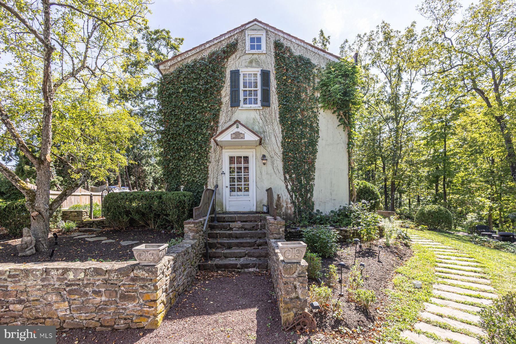 5925 Carversville Road Doylestown, PA 18902 - Photo 6 of 44 a front view of a house with a yard