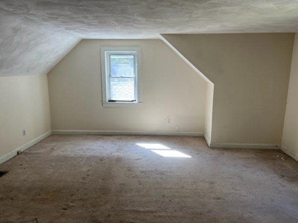 288 Sugar Road Bolton, MA 01740 - Photo 8 of 13 an empty room with a empty space and windows