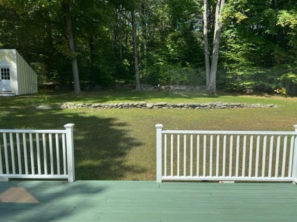 288 Sugar Road Bolton, MA 01740 - Photo 10 of 13 a view of a wooden deck