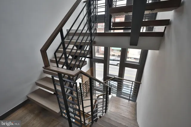 stairs and windows in a room