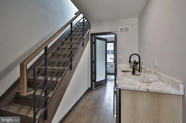 a view of living room with furniture and window