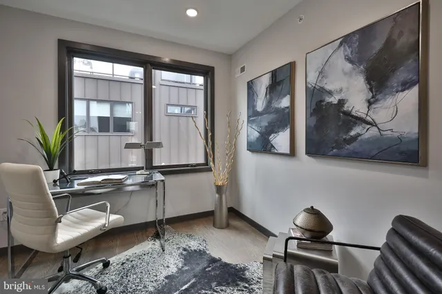 a very nice looking room with many windows