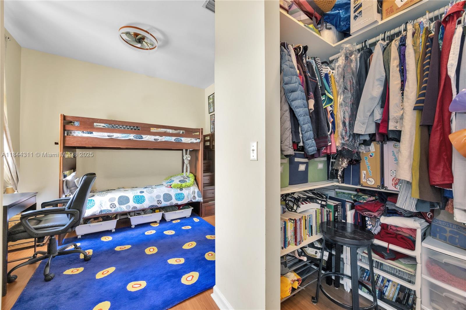 2850 Coconut Avenue, Unit 15 Miami, FL 33133 - Photo 25 of 32 a view of walk in closet with clothes and shoes