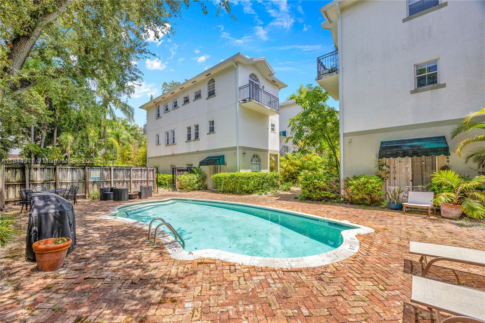 2850 Coconut Avenue, Unit 15 Miami, FL 33133 - Photo 29 of 32 a view of a house with entertaining space