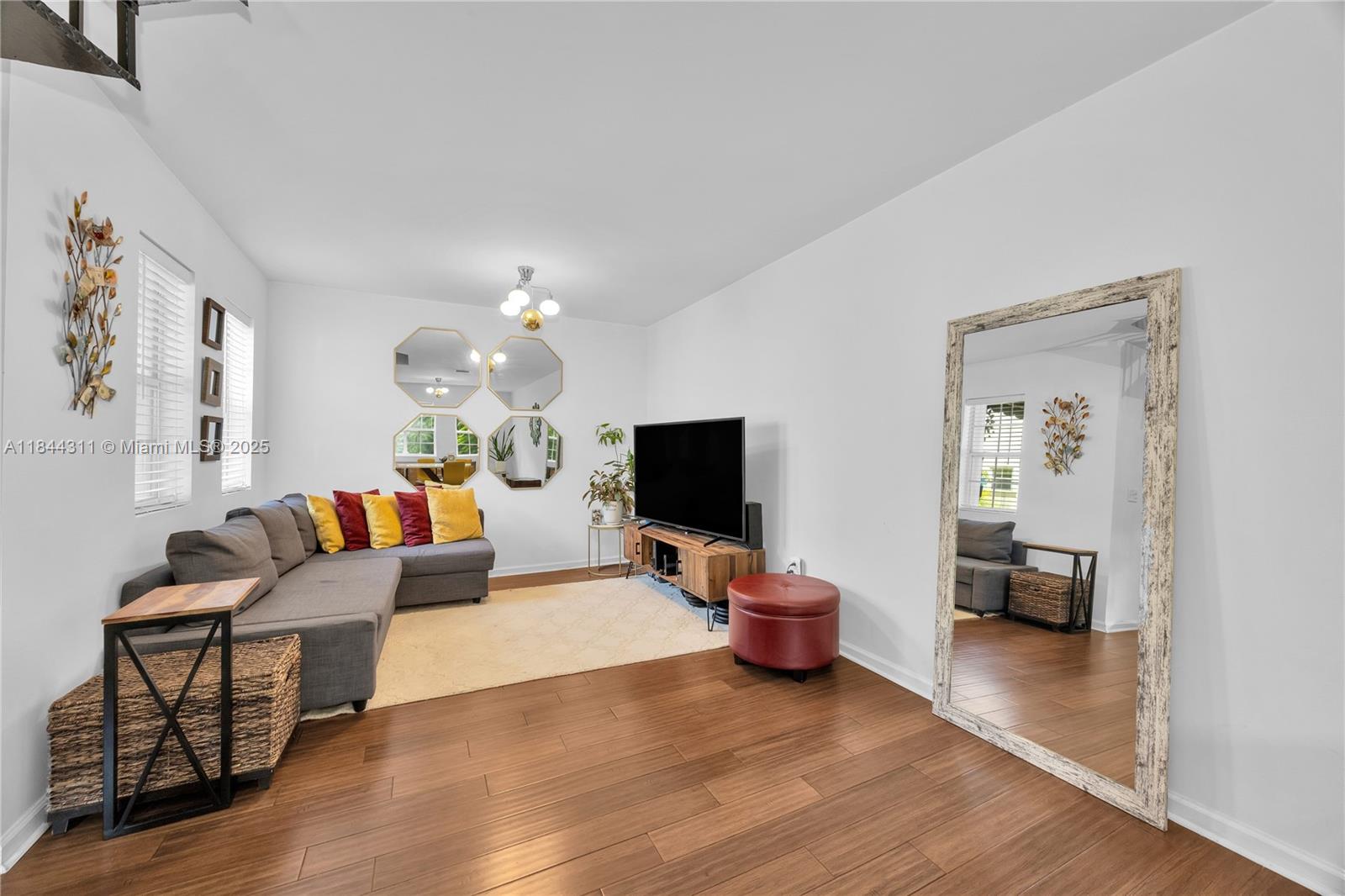 2850 Coconut Avenue, Unit 15 Miami, FL 33133 - Photo 9 of 32 a living room with furniture and a flat screen tv