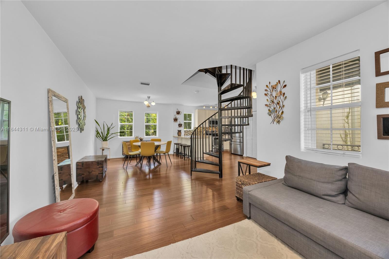2850 Coconut Avenue, Unit 15 Miami, FL 33133 - Photo 10 of 32 a living room with furniture and wooden floor